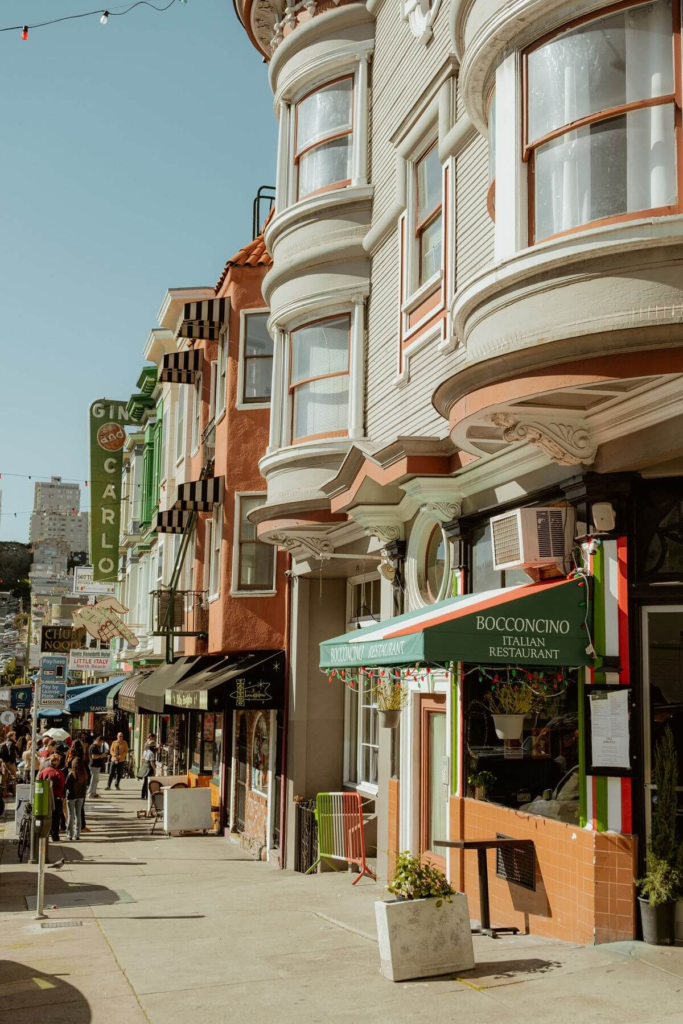 Colorful storefronts and Italian restaurant in San Francisco’s vibrant Little Italy neighborhood.