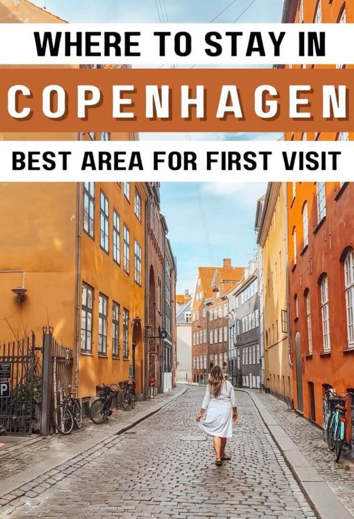 Person walking on a cobblestone street in Copenhagen