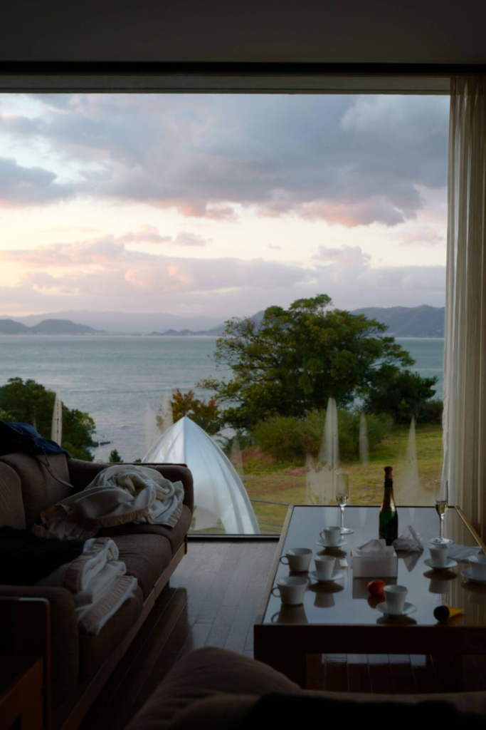 Ocean view from a cozy living room with large window at Benesse House, Naoshima Japan.