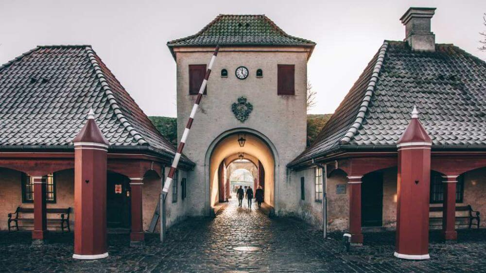 Entrance gate of Kastellet fortress in Copenhagen with cobblestone path