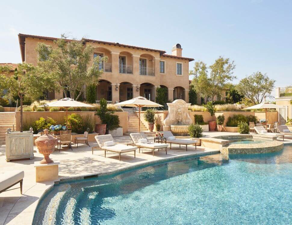 Luxury California hotel with elegant pool, terrace, and Mediterranean-style architecture